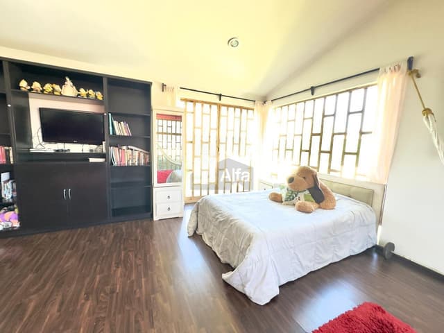 Residencia con gran jardín y potencial en Metepec