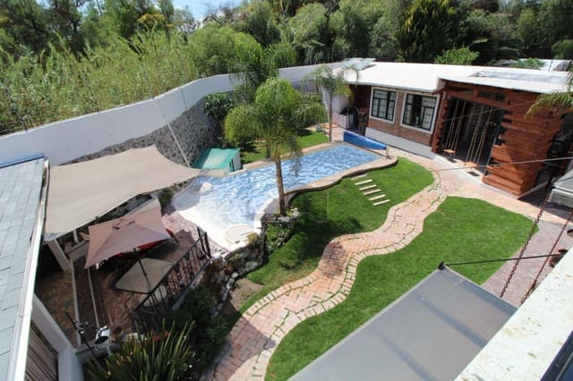 Residencia en venta en Juriquilla esitilo San Miguel de Allende 1,088 m de Terreno