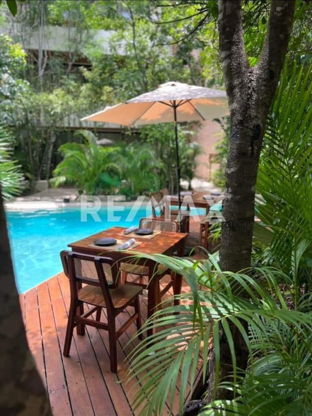 EN VENTA DEPARTAMENTO EN EXCLUSIVO EIFICIO DENTRO ALDEA ZAMA TULUM