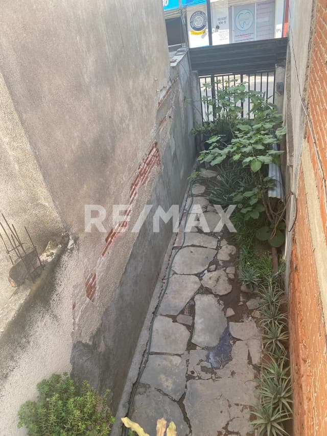 Terreno con construccion