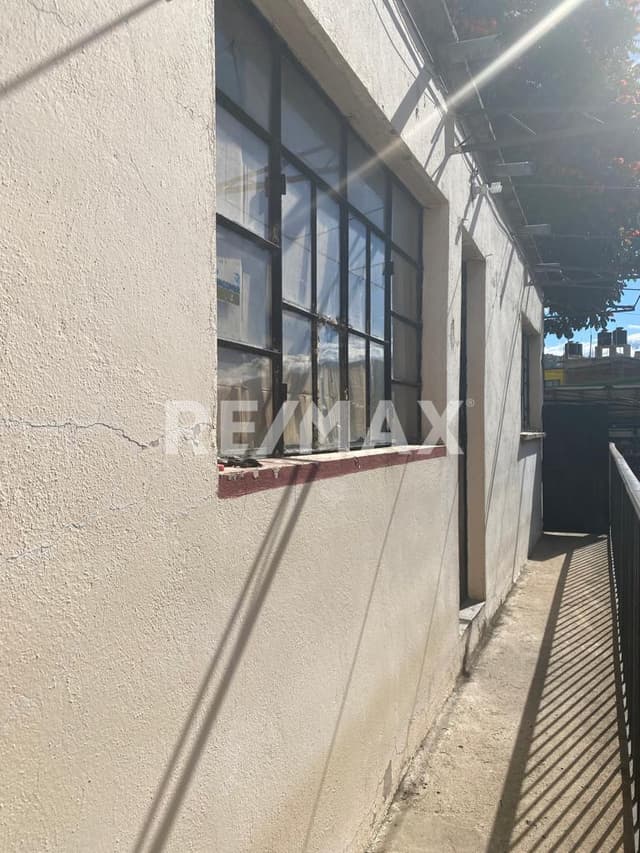 Terreno con construccion