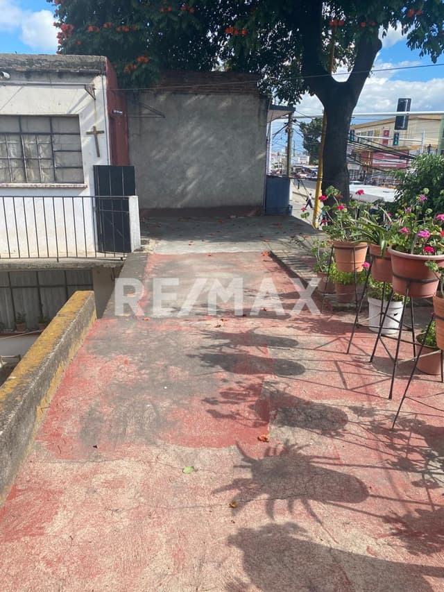 Terreno con construccion