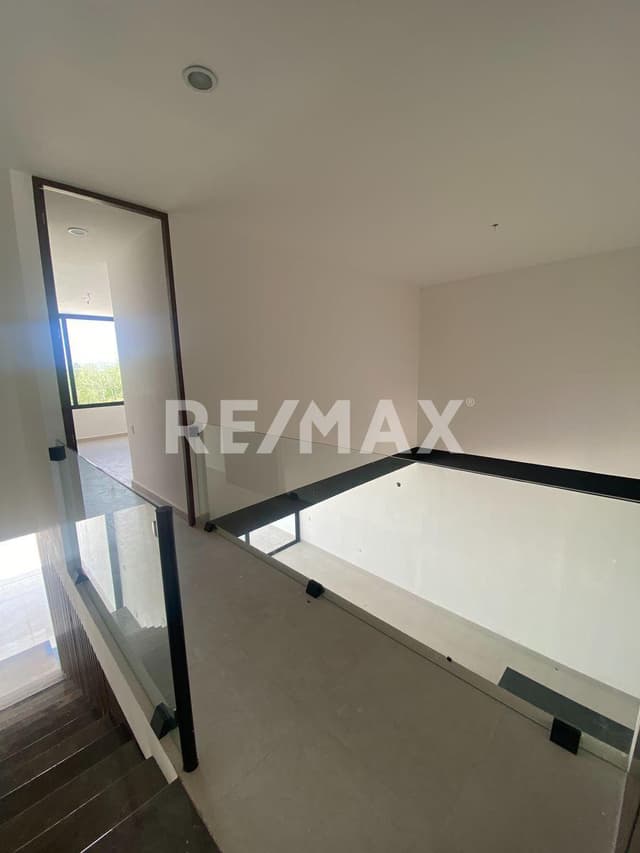 Venta Town House con Piscina en Privada Xcanatún.