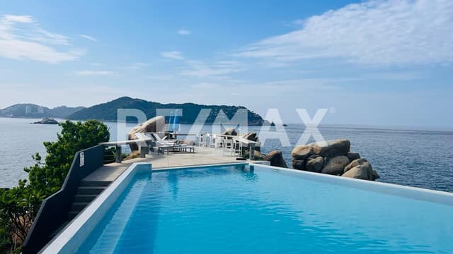 DEPARTAMENTO EN DOS NIVELES CON ALBERCA UNA VISTA TOTAL AL MAR EN BRISAS DEL MARQUES ACAPULCO