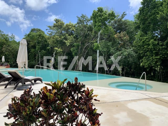 TAO RAM 2 Bedroom Ground Floor Condo For Sale in Bahia Principe