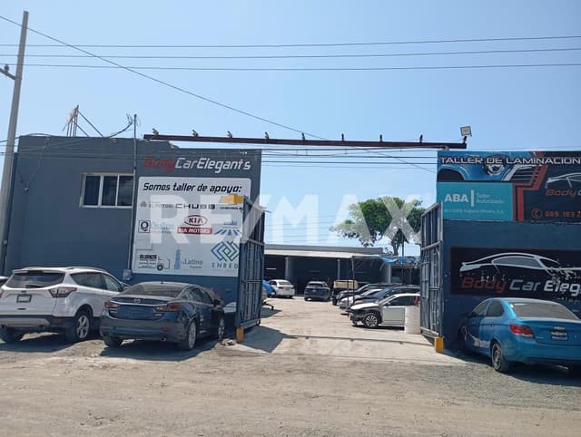 Terreno Industrial con oficinas, excelente ubicacion  dentro de la ciudad.