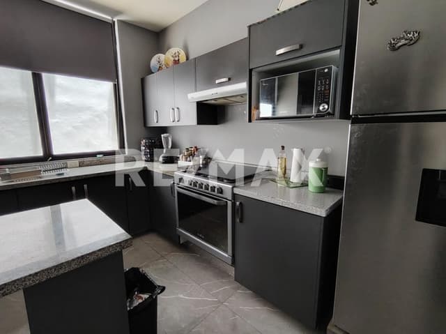 Casa de una planta con alberca y terraza en privada premium al norte de Mérida