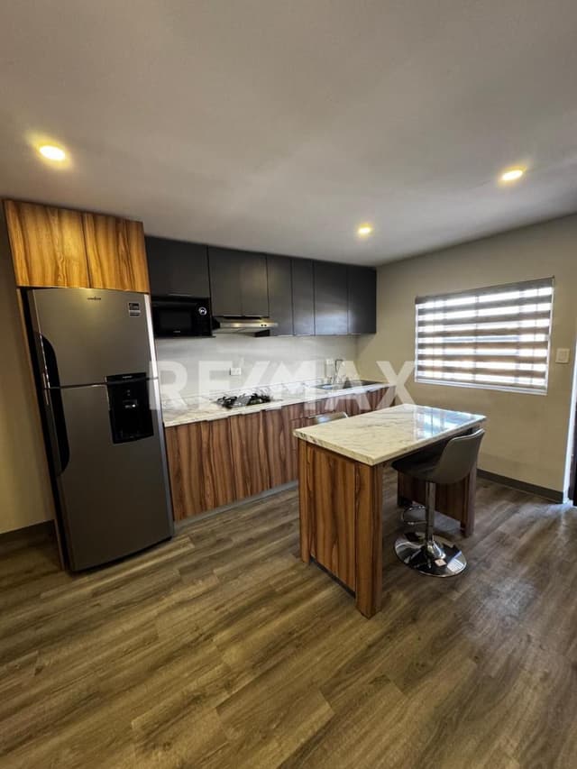 EN VENTA CONJUNTO DE CUATRO DEPARTAMENTOS RENTADOS EN FRACC. MAGISTERIAL 