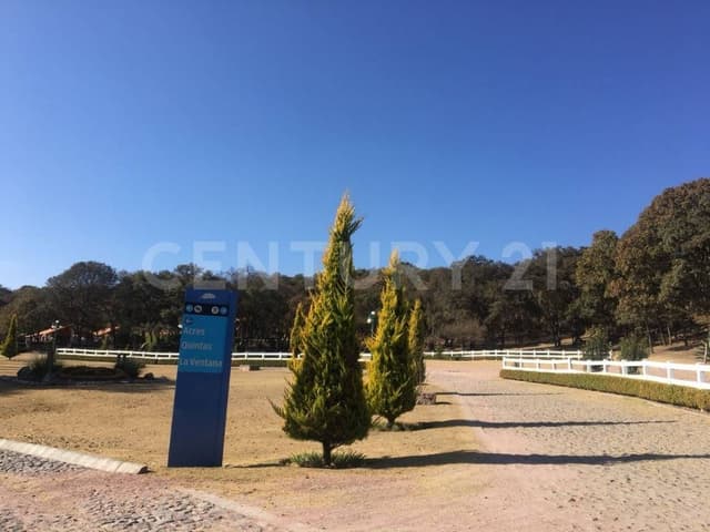 TERRENO EN VENTA DENTRO DE FRACCIONAMIENTO EN HARAS DEL BOSQUE.