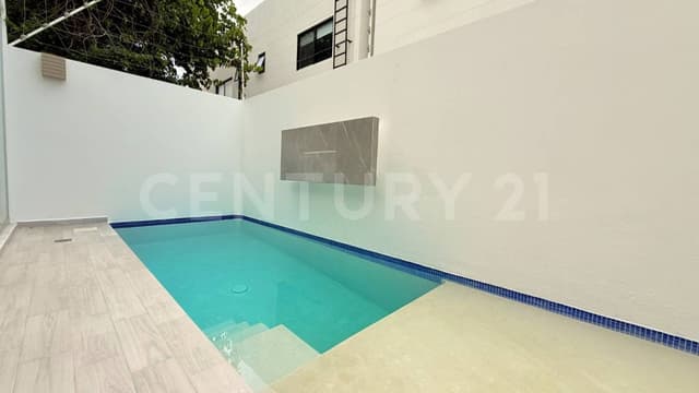 Casa en Venta con alberca privada y diseño contemporáneo - Arbolada Cancún.
