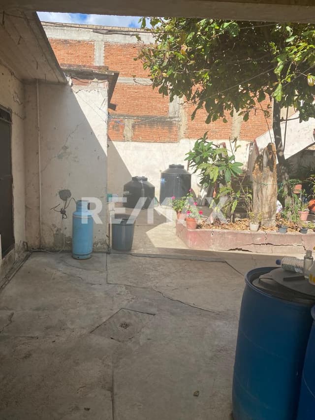 Terreno con construccion