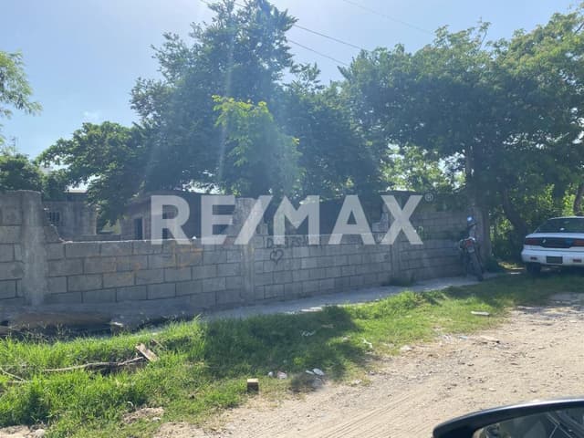 Terreno con construccion