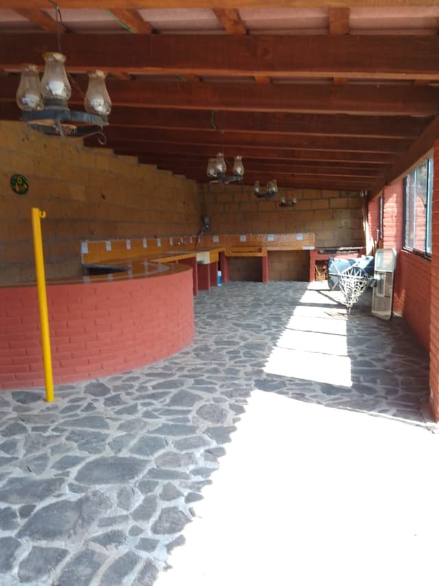 Terreno con salón de eventos en venta en Jilotepec