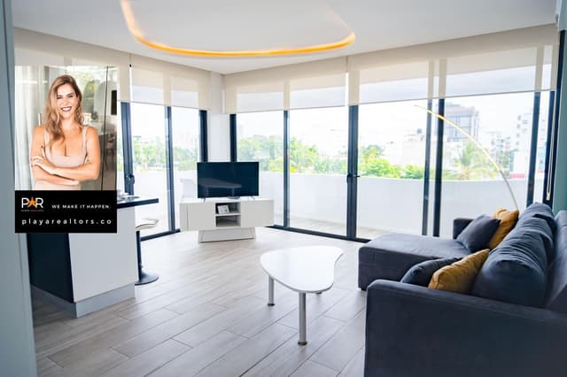 Invierta en el paraíso: Elegante apartamento a pocos pasos del mar Caribe