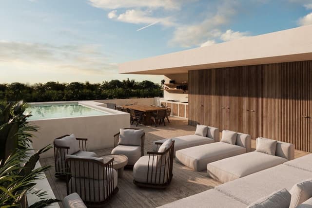 Impresionante Apartamento de 2 Recámaras con Terraza y Vistas al Atardecer Oceánico en Bahía Tankah