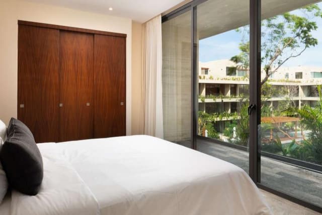 Estudio Elegante: Departamento con Terraza Expansiva y Solárium en Tulum