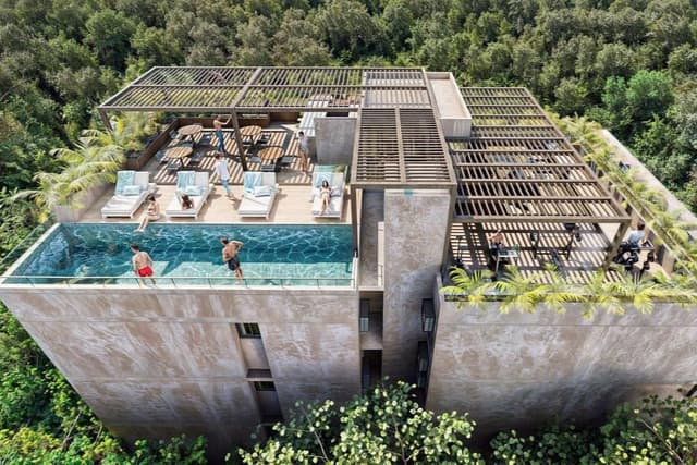 Comodidad Sofisticada: 2 Recámaras con Balcón, a Pasos de las Playas del Caribe