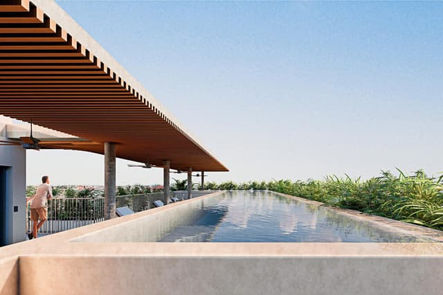 Elegante Apartamento de 2 Habitaciones con Terraza Amplia y Diseño Sostenible en Playa del Carmen