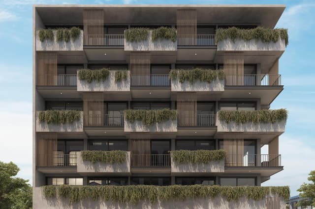 Amplio Apartamento de 2 Recámaras con Terraza y Piscina Infinita en el Centro de Playa del Carmen