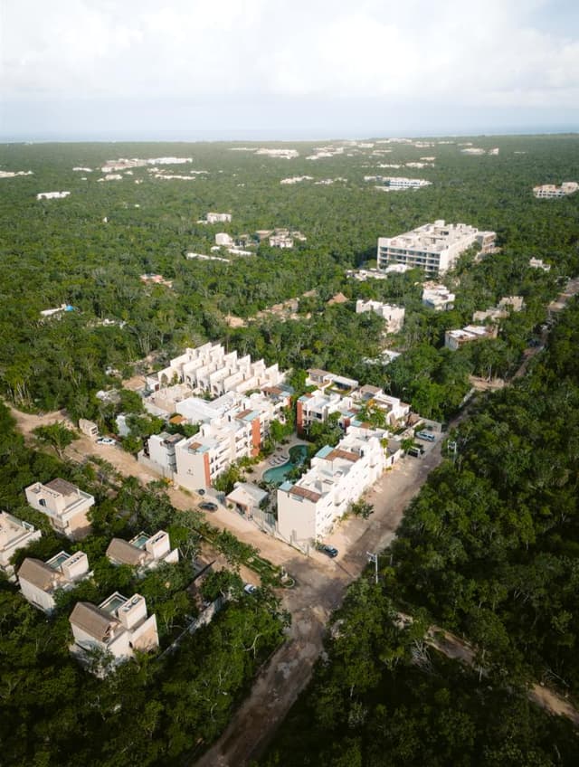 Vive la magia de Tulum: Apartamento de 1 recámara con gimnasio y alberca