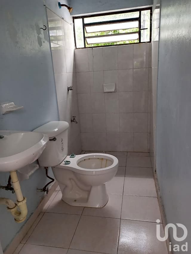 ¡Venta de excelente local con departamentos, uso de suelo mixto, bien ubicado en Bojórquez, Merida!