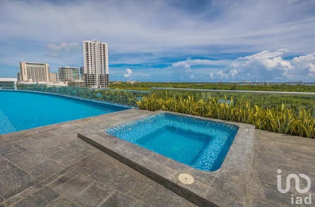 VENTA DE DEPARTAMENTO EN PLANTA BAJA EN MALECON AMERICAS CANCUN