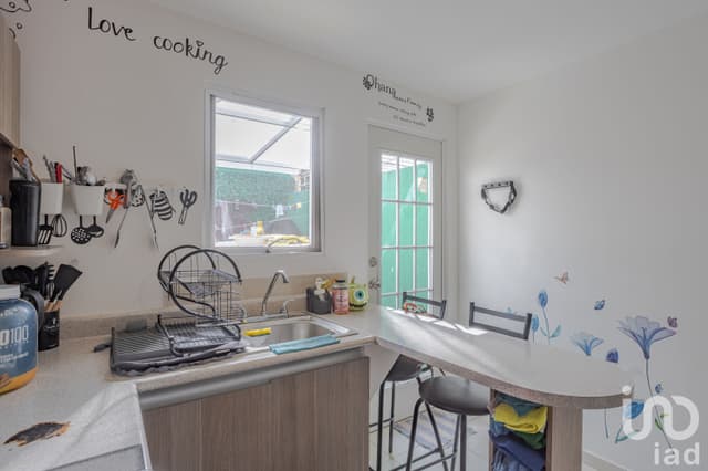 Casa en venta en Puebla, en fraccionamiento con áreas verdes.