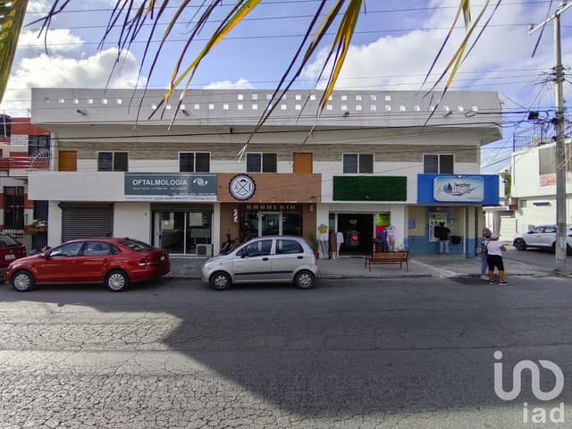 VENDO EDIFICIO EN AVENIDA, CON LOCALES Y DEPARTAMENTOS EN CANCUN, Q. ROO