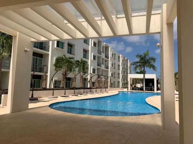 Departamento en Venta en Cancún Av. Huayacán Springs – 2 Recámaras, Alberca y Terraza
